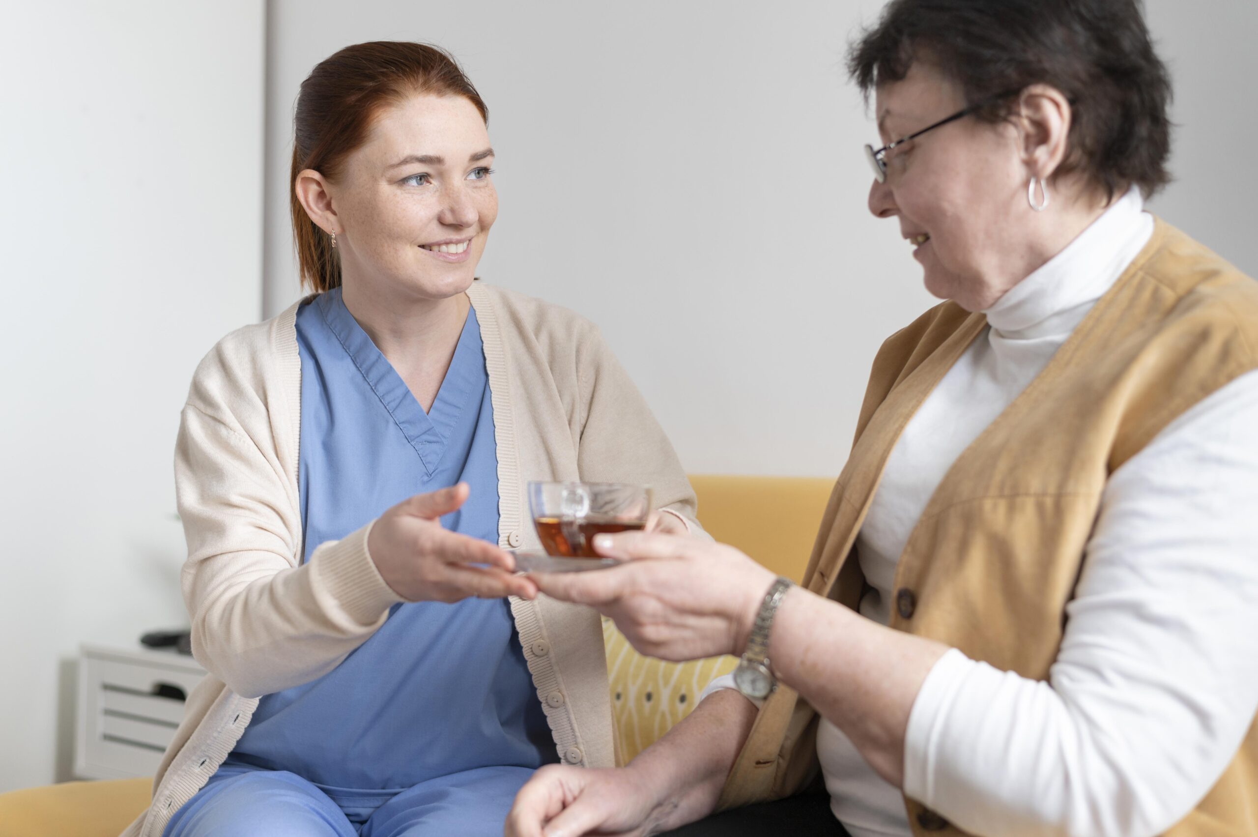medium shot woman holding tea medium shot woman holding tea
